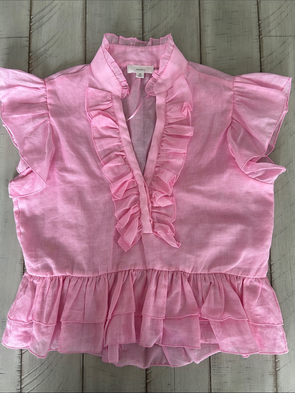 Light Pink Ruffle-Trim Peplum Blouse. Size XS